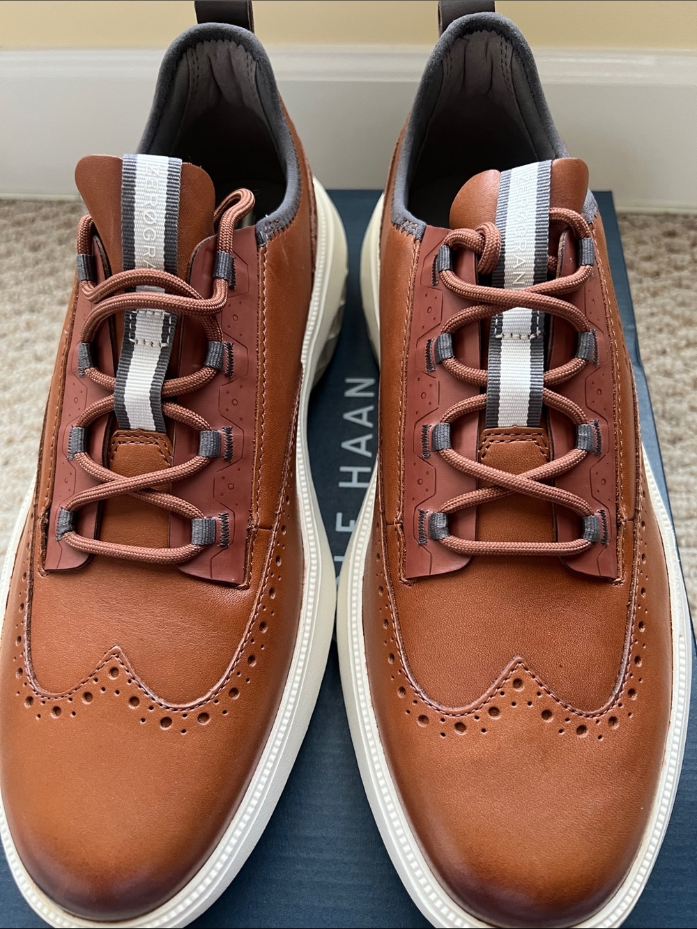 Cole Haan Tan Leather Wingtip Derby Sneakers with White Soles